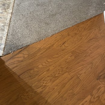 America Flooring Systems - a hardwood floor in a living room - Flooring Near Me - Stockbridge, Georgia