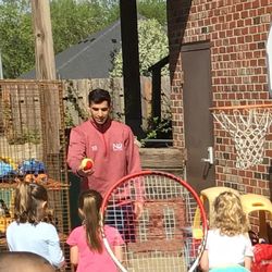 Montessori Children's Academy - Students having a lesson with a professional tennis player and assistant from Brazil.