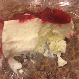 a piece of cake in a plastic container a piece of cake in a plastic container