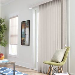 Orly's Drapery And Interiors - Graber Vertical Blinds in a Living Room