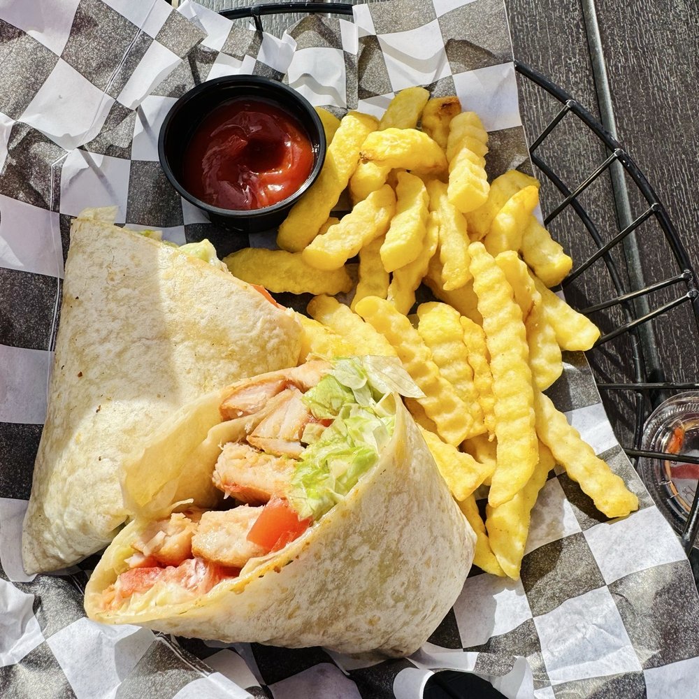 Ed's Tavern - Chicken Caesar Wrap - American Near Me - Charlotte, North Carolina Ed's Tavern - Chicken Caesar Wrap - American Near Me - Charlotte, North Carolina