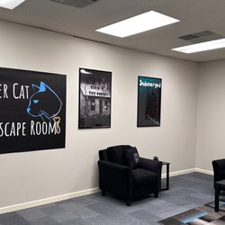 The Clever Cat Escape Rooms