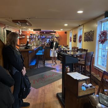 Melaza Bistro - a group of people in a restaurant - Tapas/Small Plates Near Me - Woodstock, Vermont Melaza Bistro - a group of people in a restaurant - Tapas/Small Plates Near Me - Woodstock, Vermont