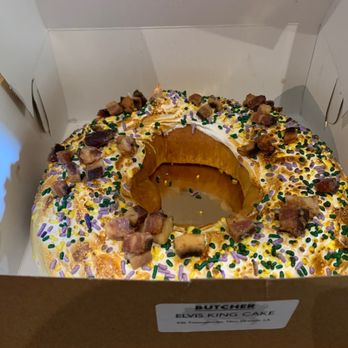 Cochon RESTAURANT - A friend of mine got this and bragged to me when it WAS Mardi Gras. Elvis King Cake (seasonal) - Cajun/Creole Near Me - New Orleans, Louisiana Cochon RESTAURANT - A friend of mine got this and bragged to me when it WAS Mardi Gras. Elvis King Cake (seasonal) - Cajun/Creole Near Me - New Orleans, Louisiana