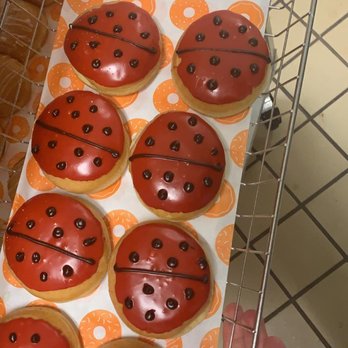 Dunkin' - a person holding a box of donuts - Coffee & Tea Near Me - McDonough, Georgia Dunkin' - a person holding a box of donuts - Coffee & Tea Near Me - McDonough, Georgia