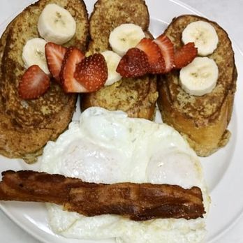 JemS Cafe - a plate of french toast, eggs, bacon and strawberries - Pancakes Near Me - La Salle, Colorado JemS Cafe - a plate of french toast, eggs, bacon and strawberries - Pancakes Near Me - La Salle, Colorado