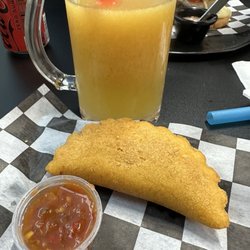 Empanada de carne & passion fruit smoothie