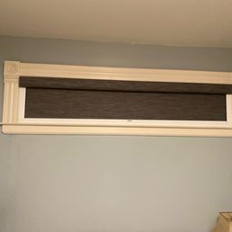 Window with black out blind. Window with black out blind.