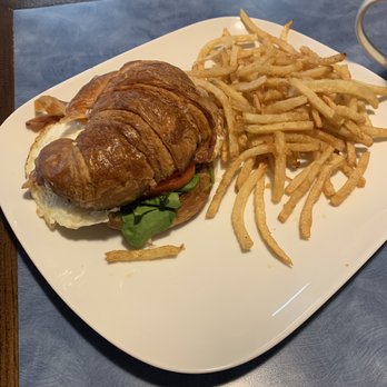 Flying With Jerome - Croissant egg sandwich and French fries - Breakfast & Brunch Near Me - Clearwater, Florida Flying With Jerome - Croissant egg sandwich and French fries - Breakfast & Brunch Near Me - Clearwater, Florida