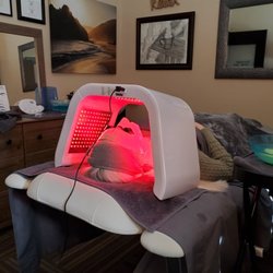 LED light treatment during facial mask.