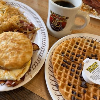 Waffle House - Hashbrowns with ham, bacon, egg, and cheese biscuit sandwich, chocolate chip waffle, and coffee - Breakfast & Brunch Near Me - Orlando, Florida