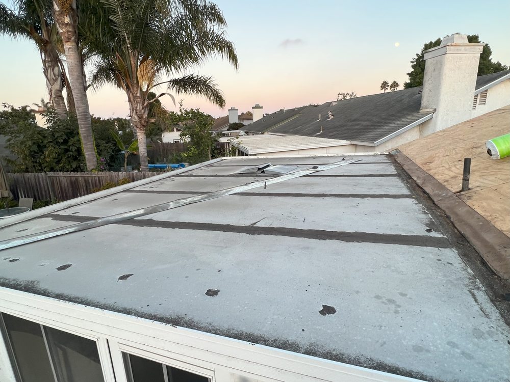 Slide of El Puma Roofing