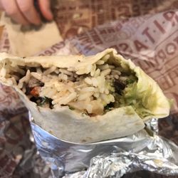 Tortilla - Oxford - Veggie Burrito. Cilantro (coriander) rice, black beans, fajita veggies, sour cream, cheese, mild salsa and guac.