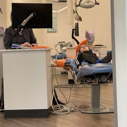 Pediatric Dentistry of Colleyville - This one shows my 6 year old watching tv with the headphones.