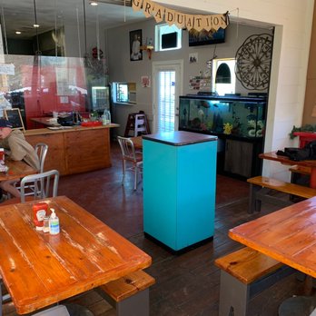 Freedom Burgers And More - a man sitting at a table - Burgers Near Me - Azle, Texas Freedom Burgers And More - a man sitting at a table - Burgers Near Me - Azle, Texas