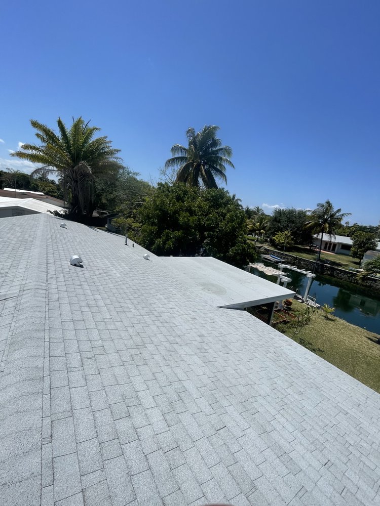 Slide of SM Roofing Service