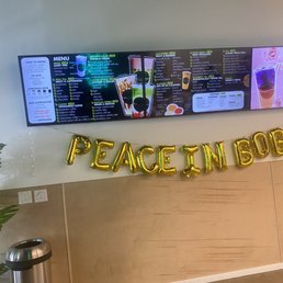Menu over "peace in boba" logo