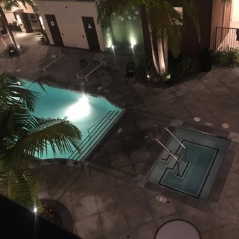 Lincoln West Apartments - View from the third floor outside my door looking down at the pool. - Apartments Near Me - Cypress, California Lincoln West Apartments - View from the third floor outside my door looking down at the pool. - Apartments Near Me - Cypress, California