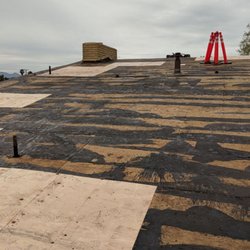 Soto Roofing Services - Existing roof removed and plywood repaired so new shingles can be installed.