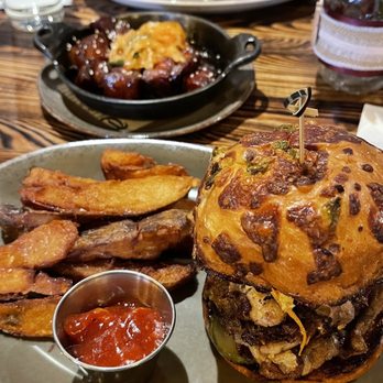 Bosscat Kitchen & Libations - Shaved pork chop sandwich $19 / Pig candy $15 / Bosscat burger $19 - New American Near Me - Irvine, California