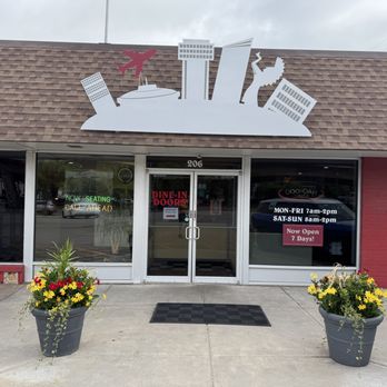 Doo-Dah Diner - The entrance shows pride in Wichita with iconic silhouettes from an airplane (Air Capital of the World) to the Keeper of the Plains. - Diners Near Me - Wichita, Kansas