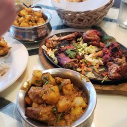 Garlic naan, potato + vegetables dishes + tandoori chk Garlic naan, potato + vegetables dishes + tandoori chk