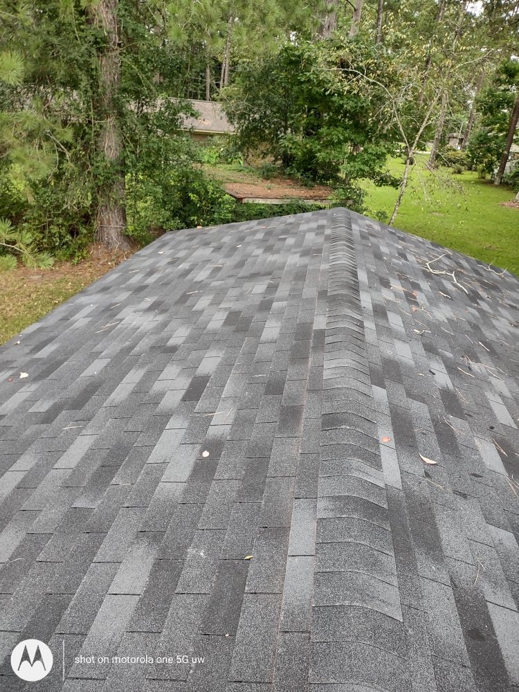 Slide of Moore's Roofing