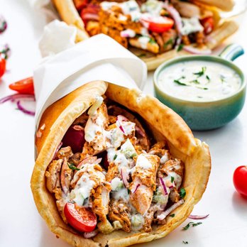 Orion Fresh Mediterranean - Warm pita wrap filled with grilled chicken, fresh vegetables, and homemade tzatziki. - Mediterranean Near Me - Boca Raton, Florida Orion Fresh Mediterranean - Warm pita wrap filled with grilled chicken, fresh vegetables, and homemade tzatziki. - Mediterranean Near Me - Boca Raton, Florida