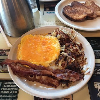 The Big Biscuit - 2 eggs overhard With cheddar cheese, bacon and hash browns. - Breakfast & Brunch Near Me - Independence, Missouri The Big Biscuit - 2 eggs overhard With cheddar cheese, bacon and hash browns. - Breakfast & Brunch Near Me - Independence, Missouri