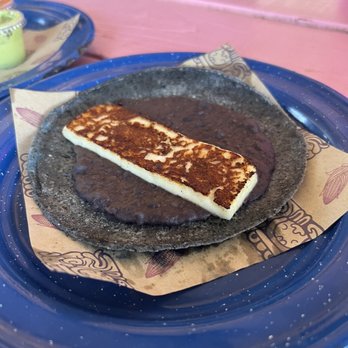 Nixta Taqueria - Duck fat re-fried beans and cheese - Mexican Near Me - Austin, Texas Nixta Taqueria - Duck fat re-fried beans and cheese - Mexican Near Me - Austin, Texas