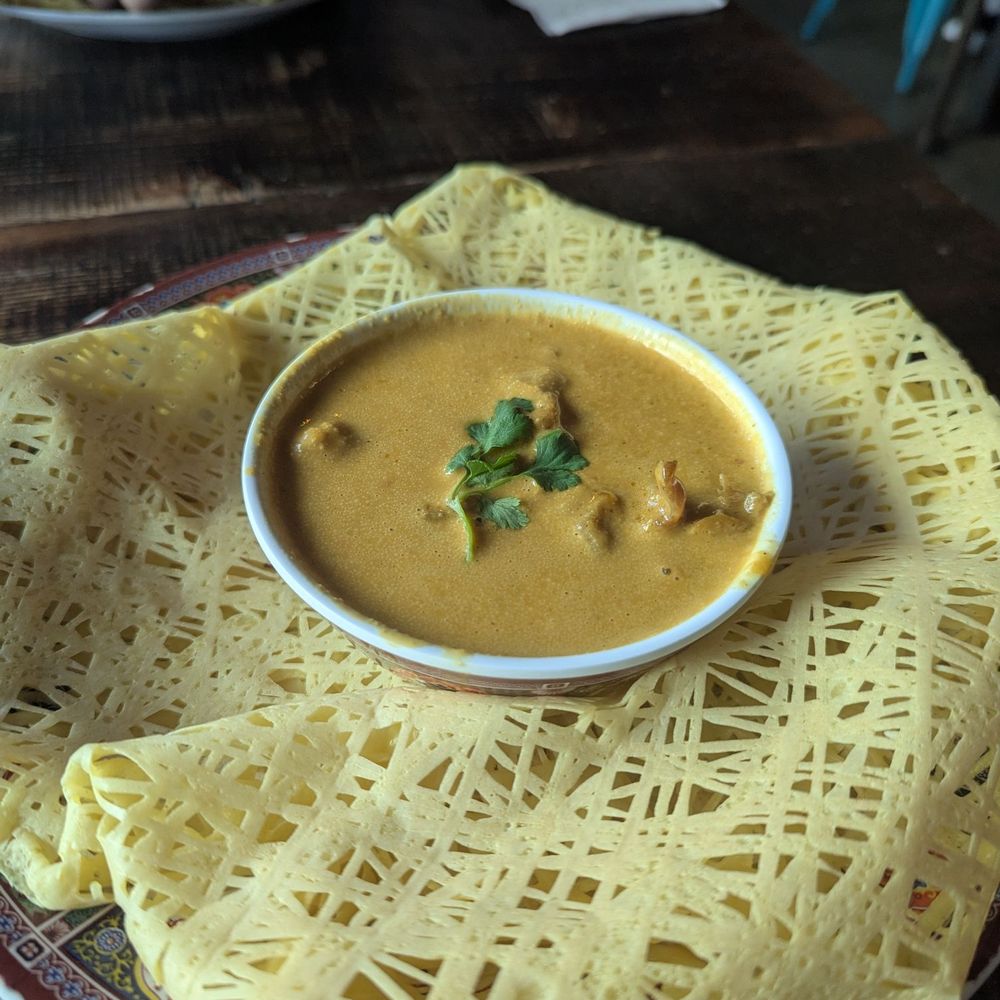 Kedai Makan - Roti Jala with Chicken curry - Malaysian Near Me - Seattle, Washington Kedai Makan - Roti Jala with Chicken curry - Malaysian Near Me - Seattle, Washington