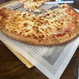Thin and boring cheese pizza for my kids $20 The Press Cheese. Thin and boring cheese pizza for my kids $20 The Press Cheese.