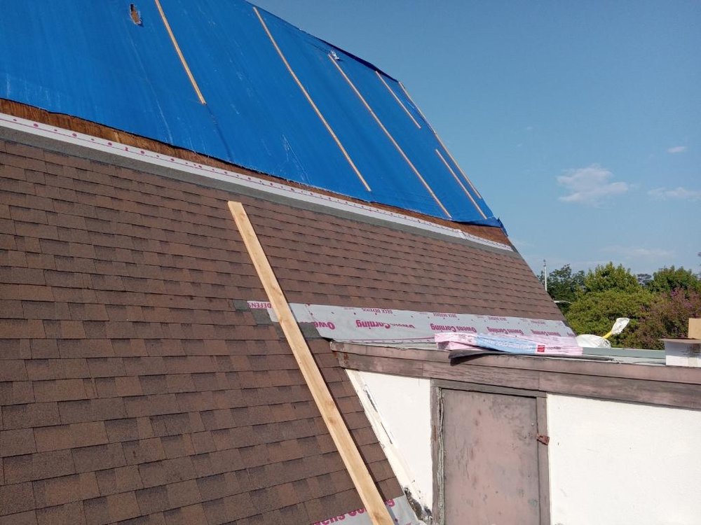 Slide of Reno's Roofing