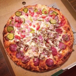 Pizzaland - This is a half n half family pizza - half rad & half amazing! - with extra garlic.