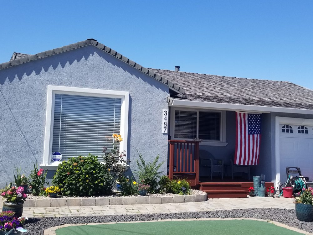 Slide of Marroquin's Roofing
