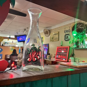 Tios Mexican Cafe - a glass vase on a counter - Mexican Near Me - Columbia, South Carolina Tios Mexican Cafe - a glass vase on a counter - Mexican Near Me - Columbia, South Carolina