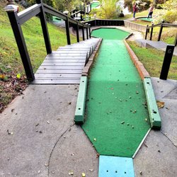 Tropical Gardens Mini Golf - Putt lightly because the ball gains a lot of momentum and will fly off the course.