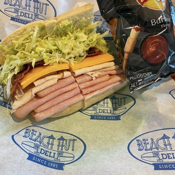 Beach Hut Deli - Two sandwiches and barbecue lays potato chips. - Delis Near Me - San Clemente, California