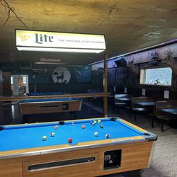 Smokehouse Bar & Grill - Pool and they have live bands on the stage in back.