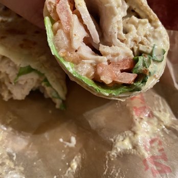 Arby's - a hand holding a sandwich - Fast Food Near Me - Louisville, Kentucky