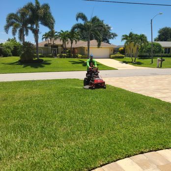 Lawn Caring Guys - a man mowing the lawn - Lawn Services Near Me Lawn Caring Guys - a man mowing the lawn - Lawn Services Near Me