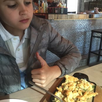 Carson Kitchen - Son eating the duck pot pie which he loved ,but was very rich and could he could not finish - New American Near Me - Las Vegas, Nevada Carson Kitchen - Son eating the duck pot pie which he loved ,but was very rich and could he could not finish - New American Near Me - Las Vegas, Nevada