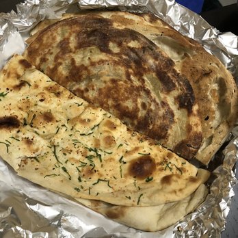 Sakoon - Bread Basket (6 huge half-pieces including paratha, garlic naan, etc.) - Indian Near Me - Mountain View, California Sakoon - Bread Basket (6 huge half-pieces including paratha, garlic naan, etc.) - Indian Near Me - Mountain View, California