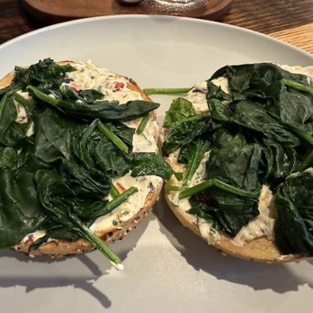 Pressed Cafe - Seaport - Bagel with vegan tomato cream cheese and spinach added - Breakfast & Brunch Near Me - Boston, Massachusetts