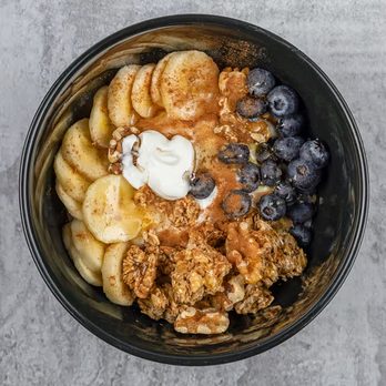 Fat Rigo - Rigo Parfait. 30 grams of protein. Greek organic yogurt, banana, blueberries, cinnamon, granola, raw unfiltered honey. - Breakfast & Brunch Near Me