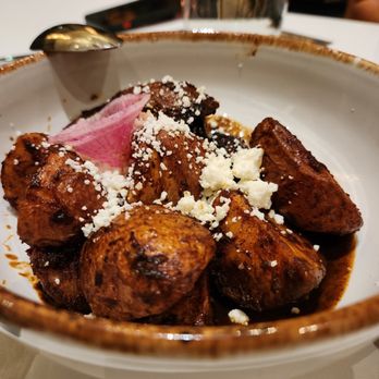 Xochi - Molotes Stuffed with Potato and Chorizo - Mexican Near Me - Houston, Texas Xochi - Molotes Stuffed with Potato and Chorizo - Mexican Near Me - Houston, Texas