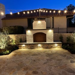 Mora Custom Concrete - Fire place 
Wrapped with stone veneer & stucco 
With concrete cap