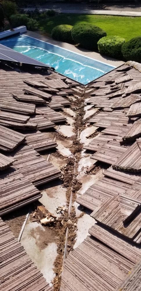 Slide of Perez Roofing