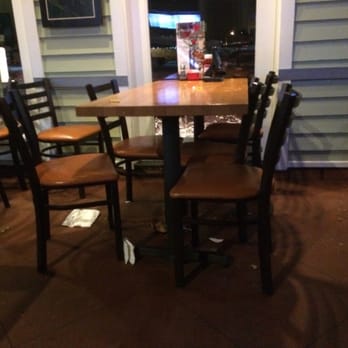Chili's - Food on tables, floor covered in food sticky spills and napkins! - Bars Near Me - Castle Rock, Colorado