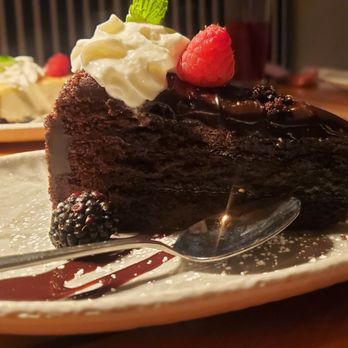 Saltwater Coastal Grill - Side view of desserts: Chocolate Cake & Ricotta Cheesecake - Mediterranean Near Me - Rosemont, Illinois
